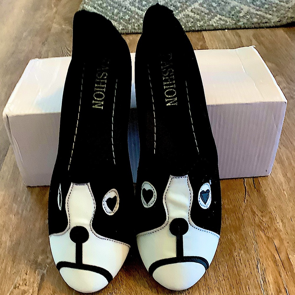 New in the box is a novelty pair of Boston Terrier slip on shoes.